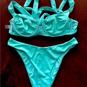 Two piece bikini swimsuit. Teal blue color never worn.